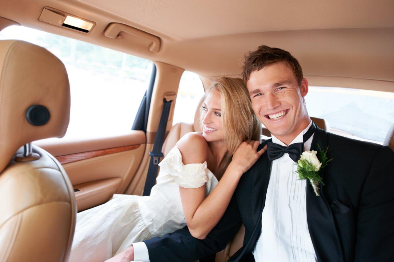 bride-and-groom-inside-limousine